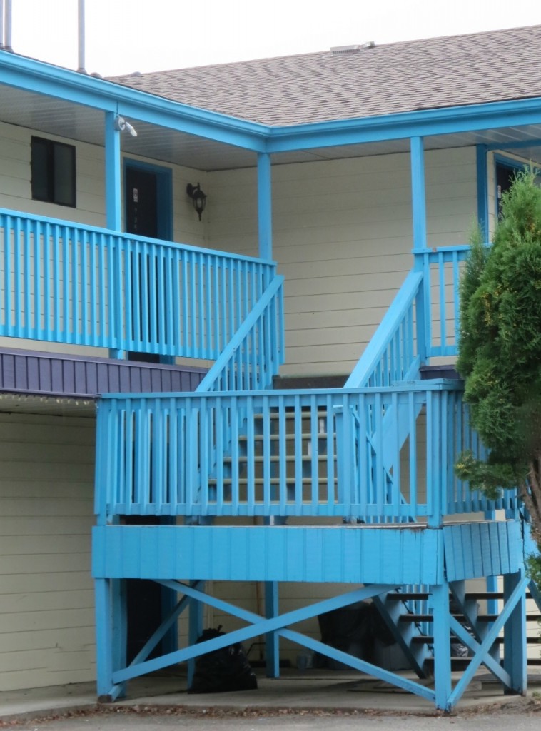 Happy Turquoise & Purple Motel Exterior in Christina Lake | Maria Killam