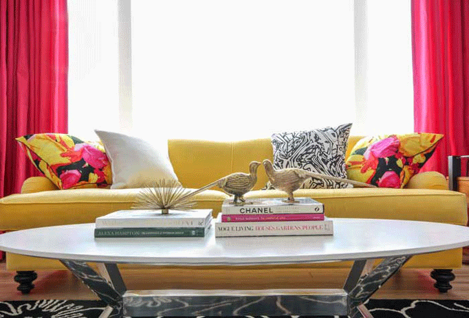 yellow sofa pink drapes