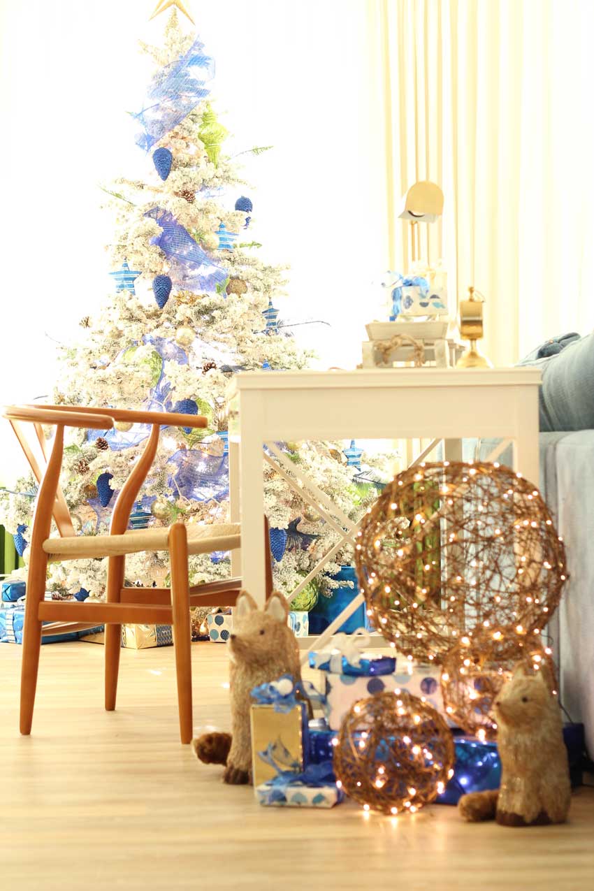 Desk and chair with white flocked christmas tree