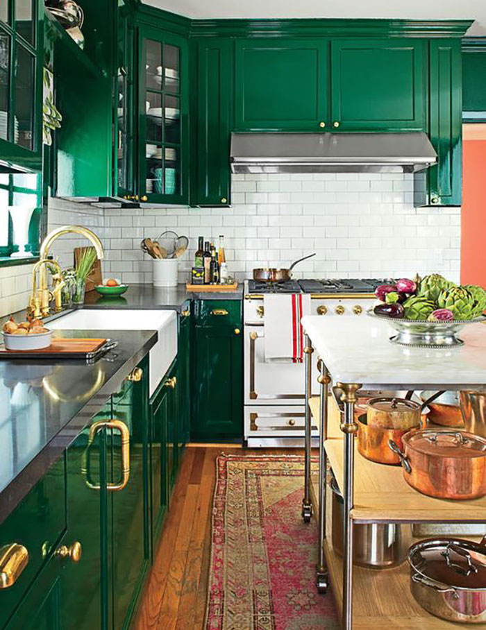 Kelly green kitchen with white subway tile backsplash