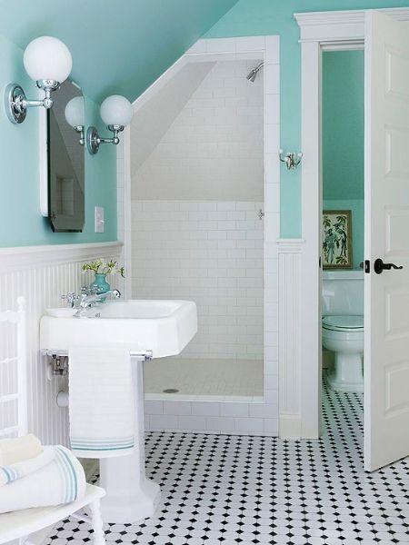 Clean turquoise bathroom black and white tile