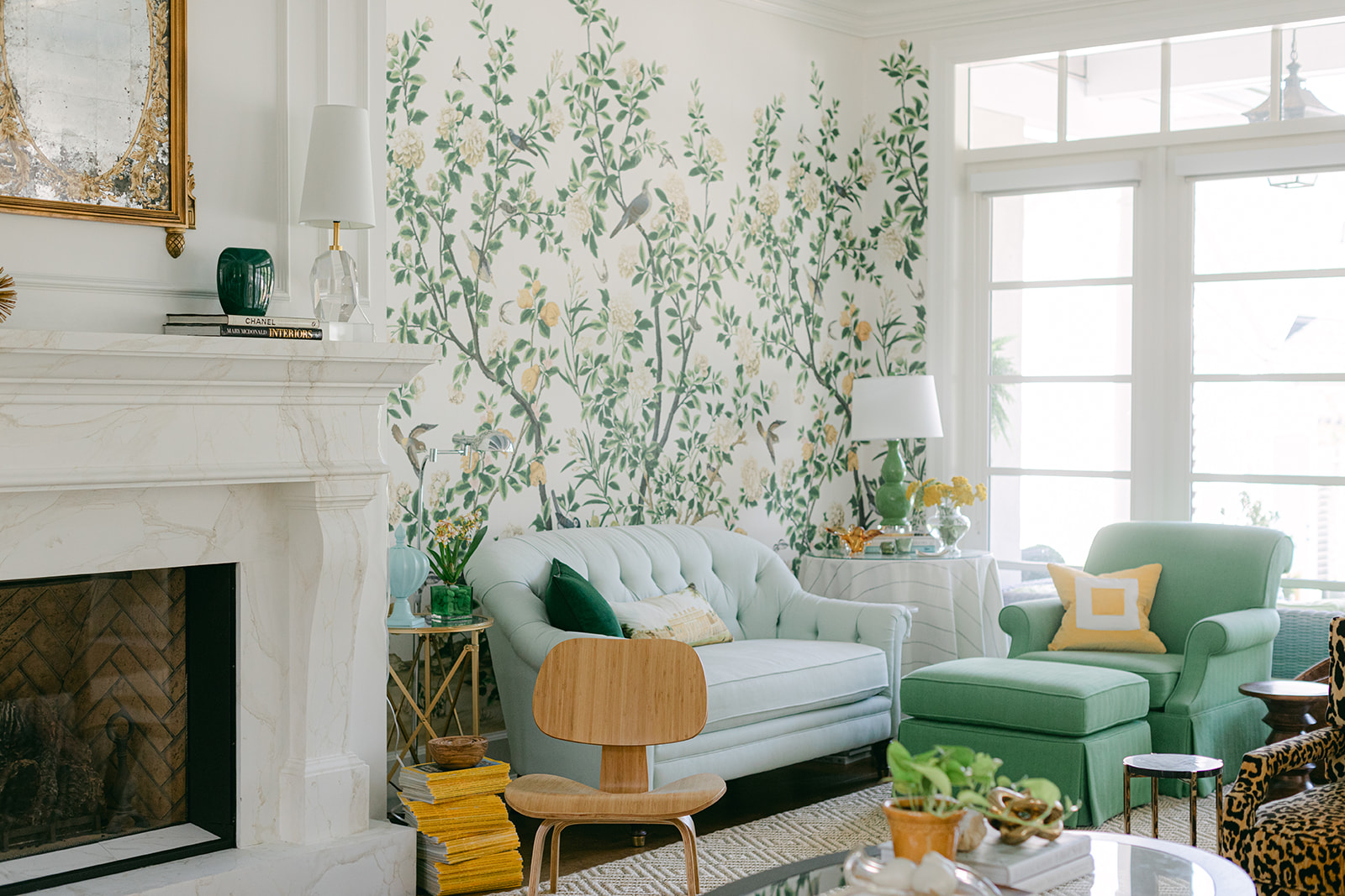 green and blue living room with gold and marble