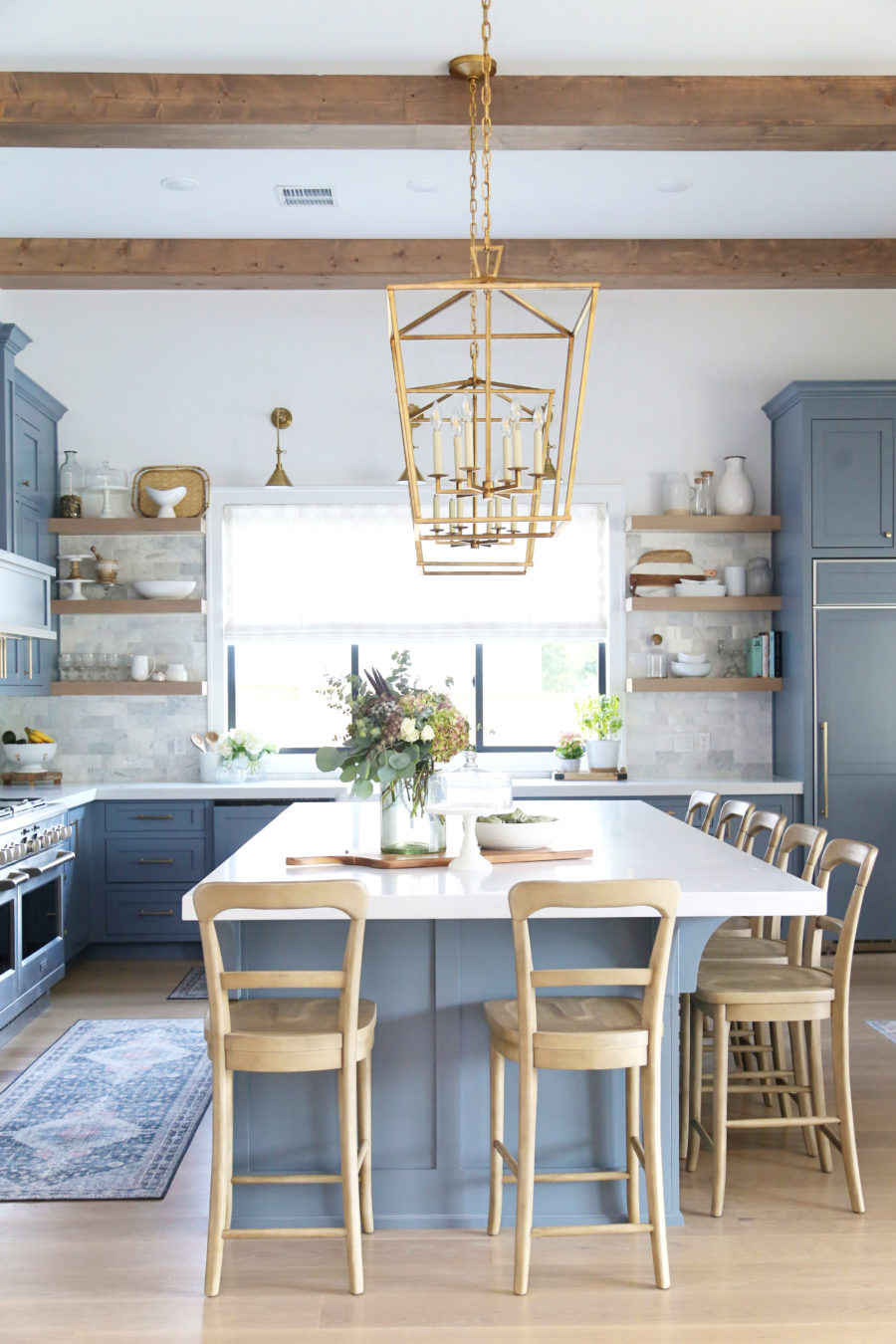 Muted blue kitchen cabinets
