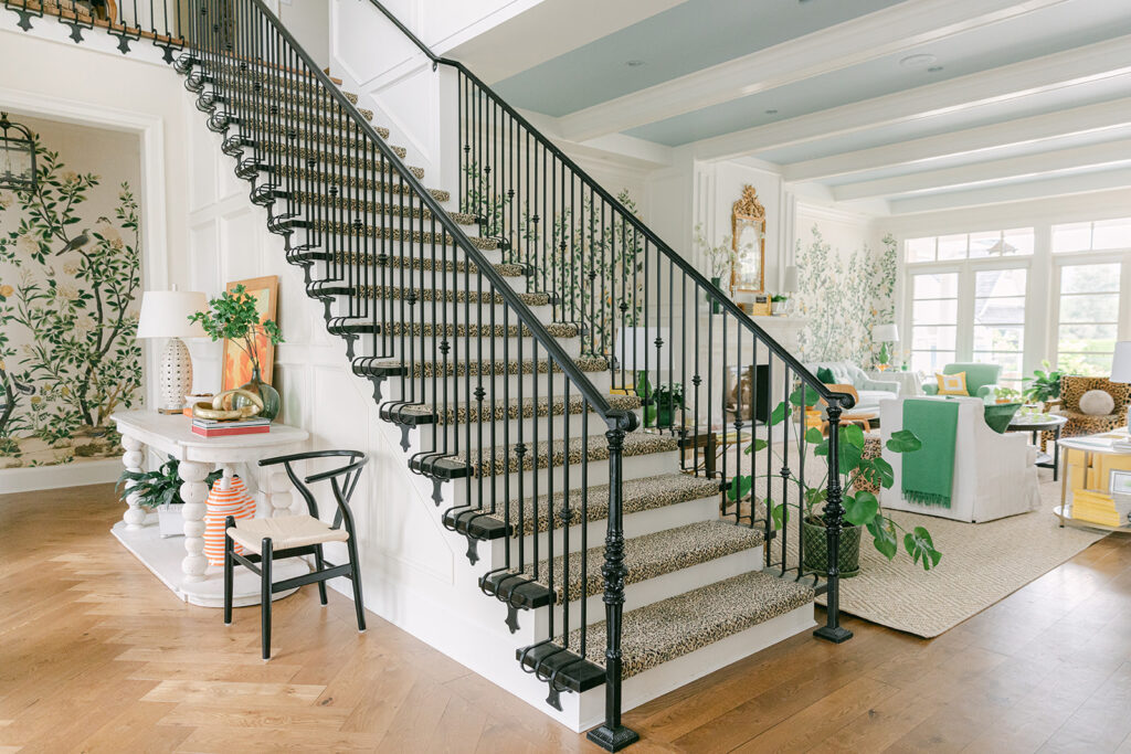 Leopard stairs with black railing