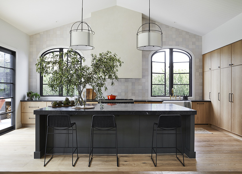 high end kitchen with black island