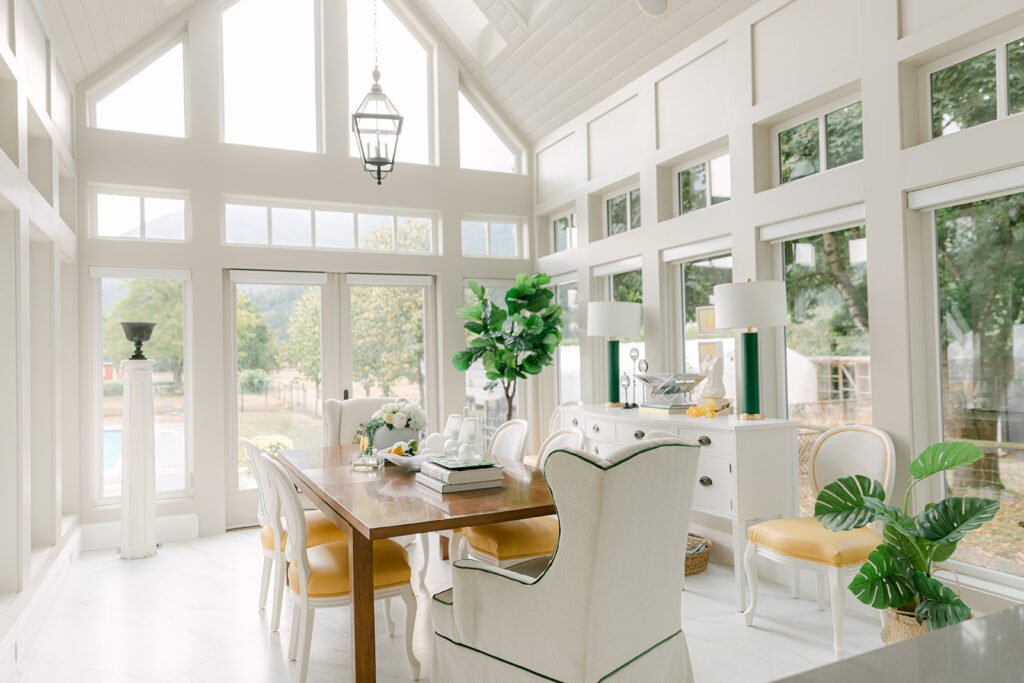 Sunroom dining room with lamps
