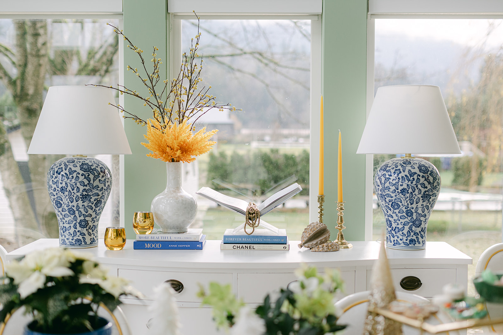 Blue and white lamp green dining room